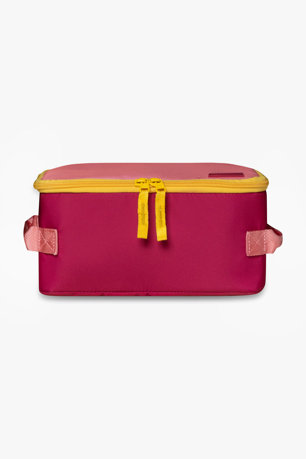 Front view of pink insulated cooler bag with yellow zipper against a white background.